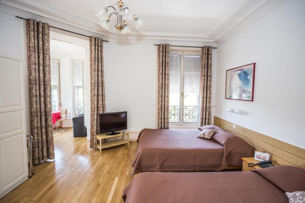 Hotel Des Tourelles Женева Номер фото